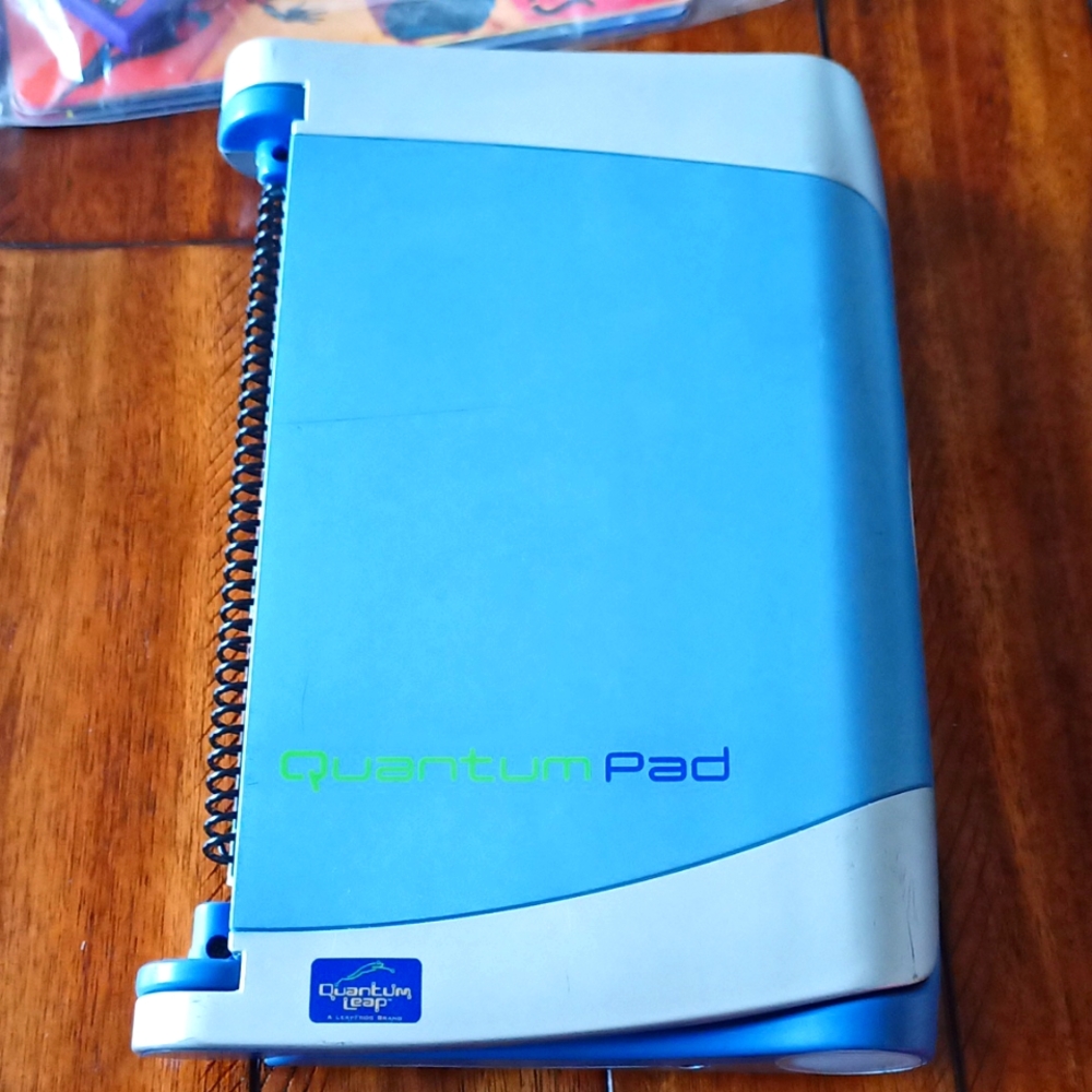 Quantum Pad with 3 books